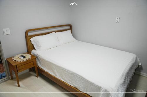 Ένα ή περισσότερα κρεβάτια σε δωμάτιο στο Gaho Guesthouse