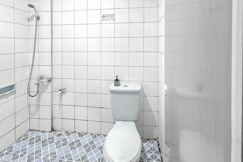 Koupelna v ubytování Fajar Indah Hotel Mitra RedDoorz