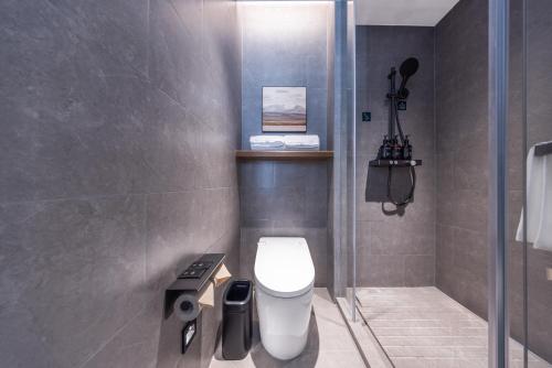 Ένα μπάνιο στο Atour Hotel Dazhou Renhe New Town East Baqu Road