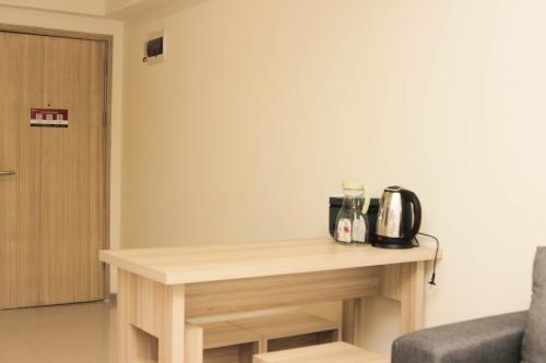 Παροχές για τσάι/καφέ στο Luxury and Comfy 2BR at Meikarta Apartment By Travelio