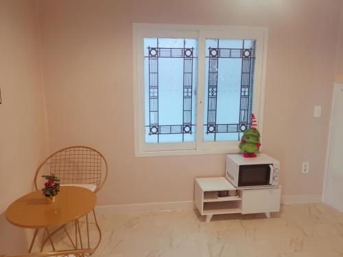 Μια τηλεόραση ή/και κέντρο ψυχαγωγίας στο 3bed house Haeundae