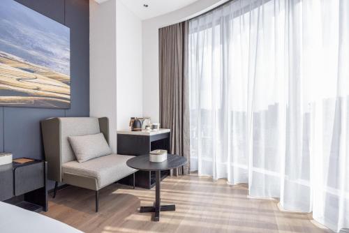 Χώρος καθιστικού στο Atour Hotel Dazhou Renhe New Town East Baqu Road