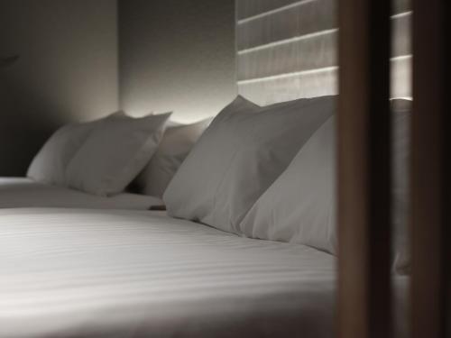 Katil atau katil-katil dalam bilik di MONday Apart Premium Kyoto Sta Kamogawa