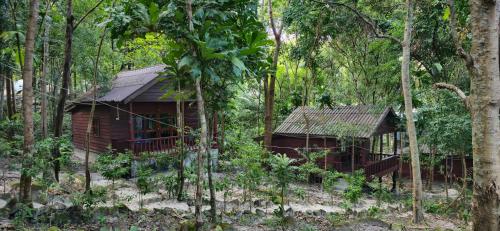 a cabin in the middle of the forest at Sambath Sakseth Bungalow in Koh Rong Island