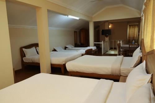 Voodi või voodid majutusasutuse Lakezone Holiday Resort toas