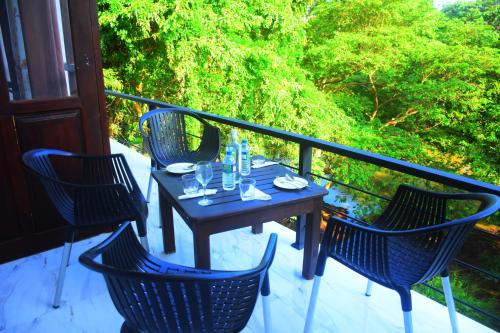 Un balcón o terraza de Sunwin River Hotel