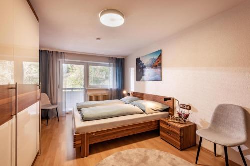 Ένα ή περισσότερα κρεβάτια σε δωμάτιο στο Ferienwohnung Pulverer