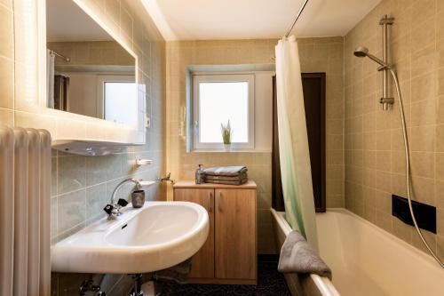 Ένα μπάνιο στο Ferienwohnung Pulverer