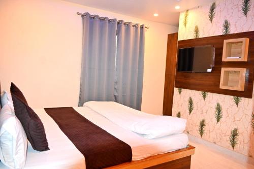 Postel nebo postele na pokoji v ubytování RSP Guest House