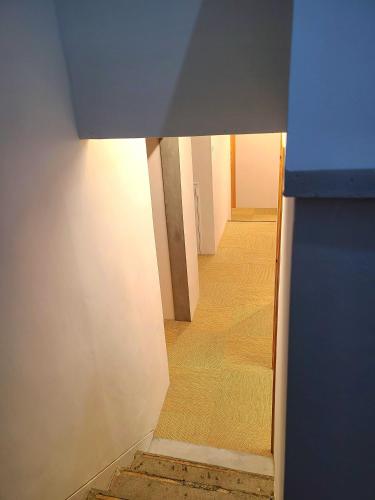 a view of a hallway in a house with a hallway at 三笠館Mikasakan 別館 in Kinokawa