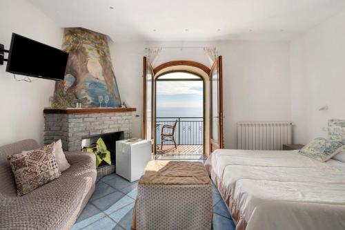 Una cama o camas en una habitación de Da Clotilde