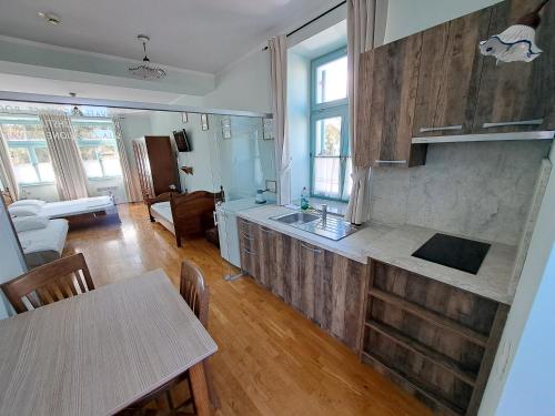 Postel nebo postele na pokoji v ubytování Parma Guesthouse & Apartments