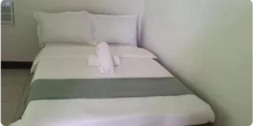 Llit o llits en una habitació de Hofberd Beach Resort