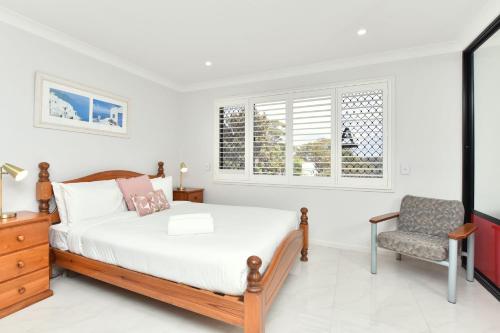 Postel nebo postele na pokoji v ubytování Bliss at Shoal Bay