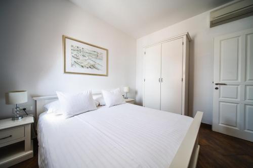 Postel nebo postele na pokoji v ubytování Apartments Vila Riva