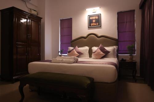 Casa Ahaana Resort Vagator, By Lavin Hotelsにあるベッド