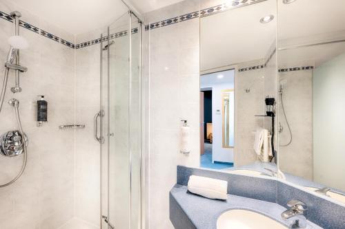 Bilik mandi di acom Apartments Essen