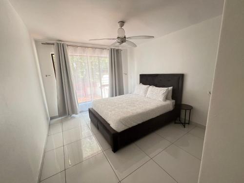 Ένα ή περισσότερα κρεβάτια σε δωμάτιο στο Harties Ways Apartment