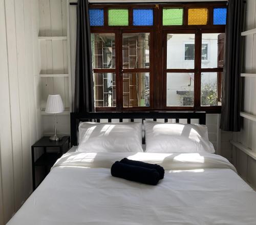 Cama o camas de una habitación en Green Cabin Hostel