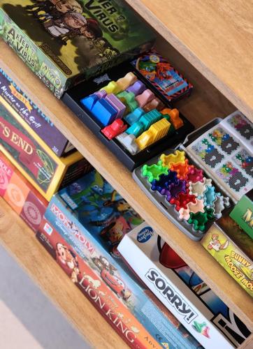 a drawer full of lego games and books at EmeraldRidge Retreat - 180 Degree Amazing View & Firepit & BBQ in Chilliwack