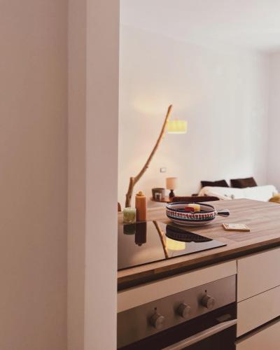 a kitchen with a stove and a counter top at La Casa di Monteverde in Rome