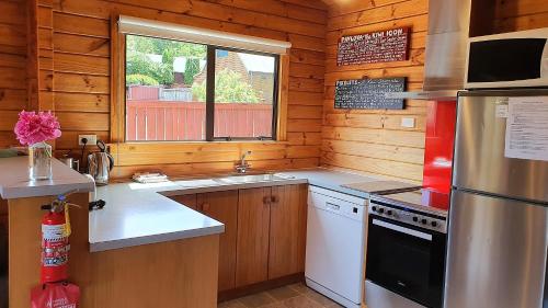 Η κουζίνα ή μικρή κουζίνα στο Hanmer's Coziest