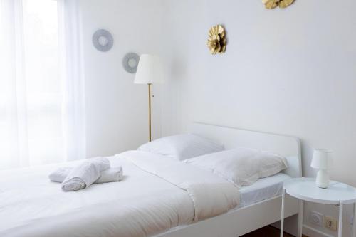 Postel nebo postele na pokoji v ubytování PeaceHome