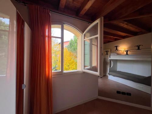 Ένα ή περισσότερα κρεβάτια σε δωμάτιο στο Casa Federica