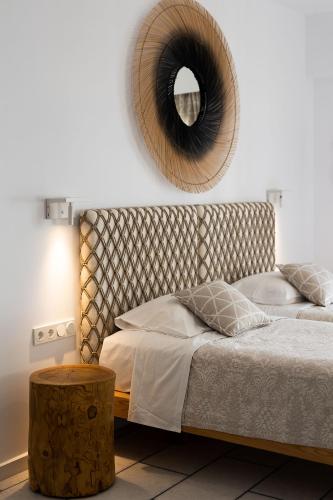 En eller flere senge i et værelse på Hotel Villa Flora
