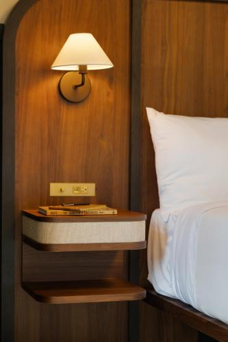 Ένα ή περισσότερα κρεβάτια σε δωμάτιο στο The Delegate Hotel