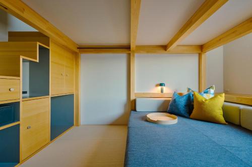 Voodi või voodid majutusasutuse OMO5 Kumamoto by Hoshino Resorts toas