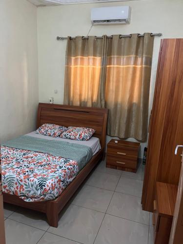 Llit o llits en una habitació de Villa MALAK