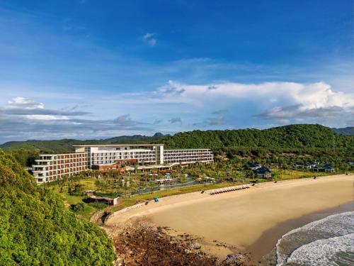 an aerial view of a hotel and the beach at Angsana Quan Lan, Ha Long Bay in Quan Lạn