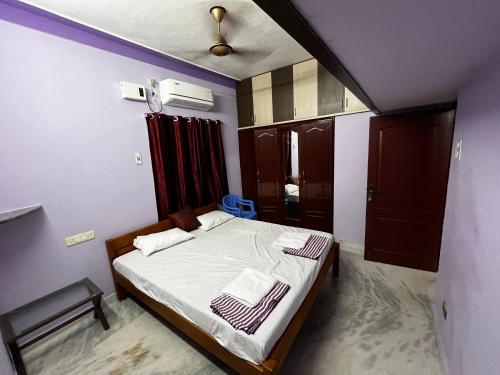 Postel nebo postele na pokoji v ubytování Annai - Home stay 3BHK