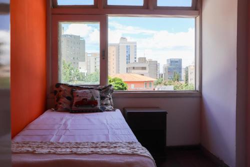 Ένα ή περισσότερα κρεβάτια σε δωμάτιο στο Hostel Lavras - Sereno