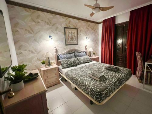 Ένα ή περισσότερα κρεβάτια σε δωμάτιο στο Marisol Apartment Vera Playa Andalusia 150 m from the Beach, Spain