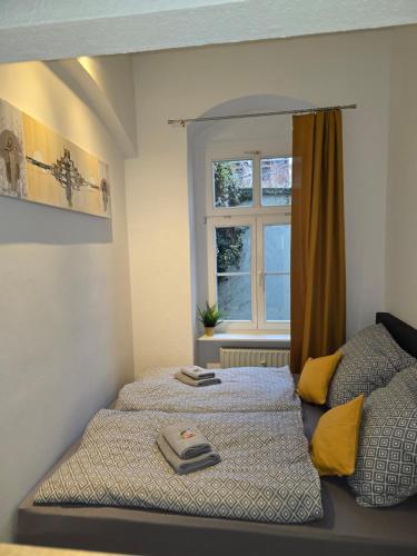 Postel nebo postele na pokoji v ubytování WohnTraum zur alten Post, Sauna, Altstadt