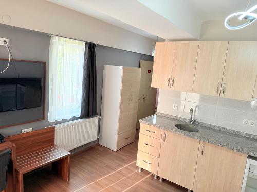 Figen Suite Hotel 2にあるキッチンまたは簡易キッチン