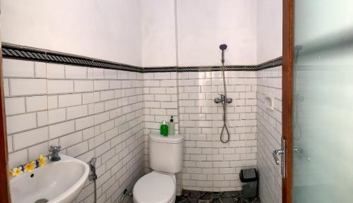 Ванная комната в Arya homestay