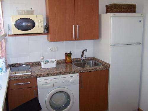 Kuchyň nebo kuchyňský kout v ubytování Apartamento Calle Goles