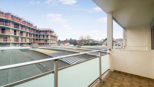 a view from the balcony of a building at HOMEY LA COLOC BRILLANT - Colocation haut de gamme de 3 chambres uniques et privées / Proche centre-ville et transports en commun / Balcons / Wifi gratuit in Annemasse