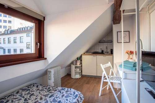 Η κουζίνα ή μικρή κουζίνα στο Stylish Loft In The Hearth Of Historic Centre