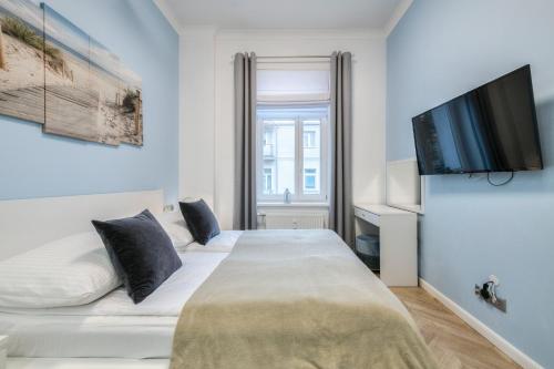 Posteľ alebo postele v izbe v ubytovaní DR Apartments - Nicea