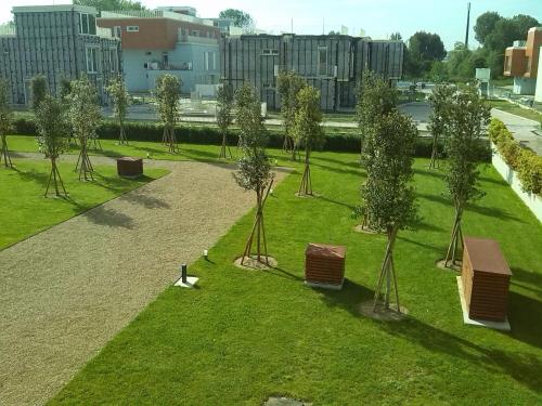 an overhead view of a park with trees in the grass at Eliopoli Beach Hostel & Restaurant in Tirrenia