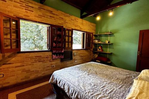 Postel nebo postele na pokoji v ubytování Casa con chimenea en Lambaré