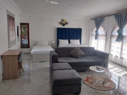 Ένα ή περισσότερα κρεβάτια σε δωμάτιο στο Erima Lodge