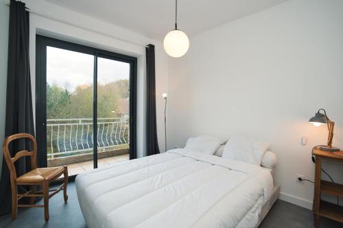 Postel nebo postele na pokoji v ubytování Votre appartement à Chalmazel
