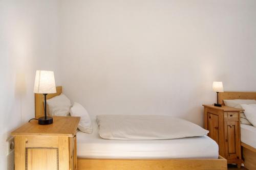 Postel nebo postele na pokoji v ubytování Haus am Hof
