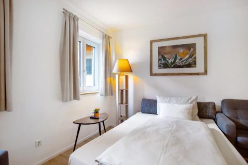 Postel nebo postele na pokoji v ubytování Haus am Hof