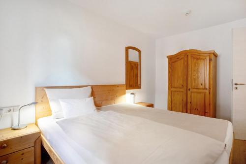 Postel nebo postele na pokoji v ubytování Haus am Hof